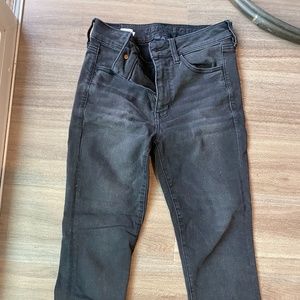 Black jeans with fringe bottoms